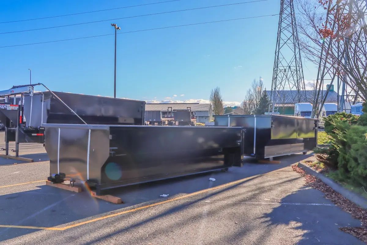 Roll-off dumpster ready for waste disposal at job site for Demolition Dumpster Rental in Aurora